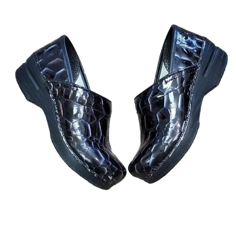 Dansko Black Animal Print Leather Clogs